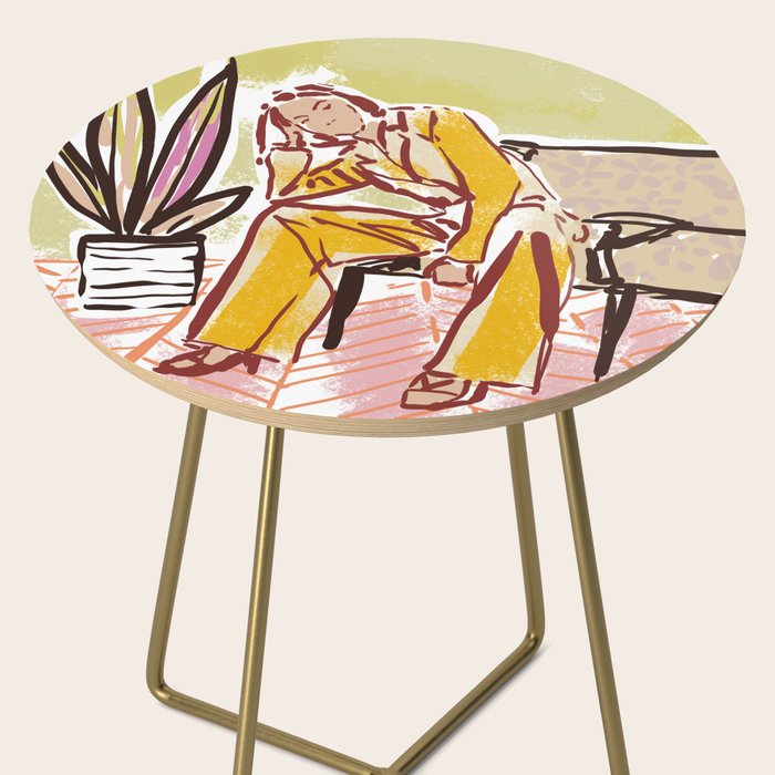 Woman sitting on sofa Side Table Gallery Image 2