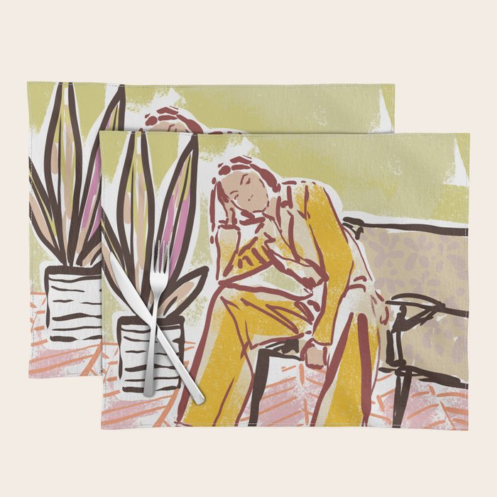 Woman sitting on sofa Placemat Gallery Image 1