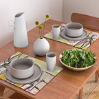 Woman sitting on sofa Placemat Gallery Image 2