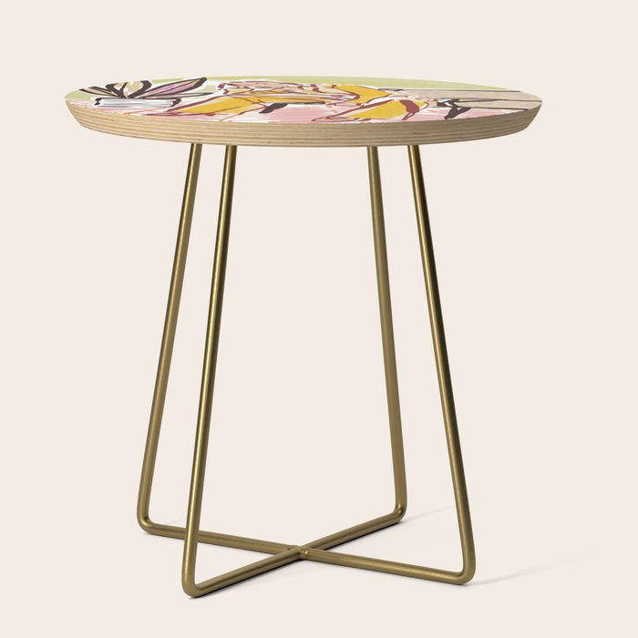 Woman sitting on sofa Side Table Gallery Image 1