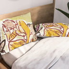 Woman sitting on sofa Pillow Sham Gallery Image 2