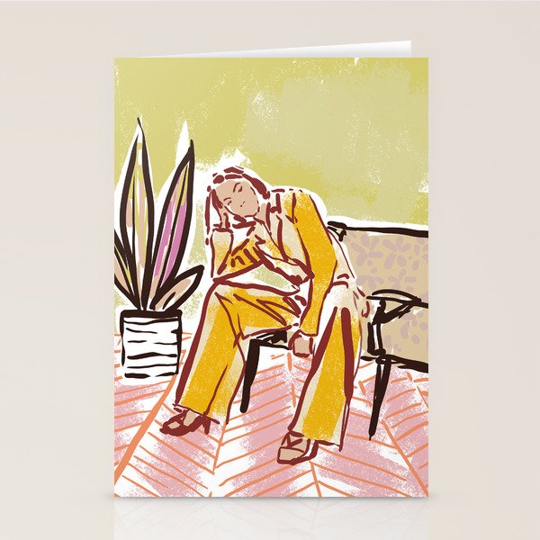 Woman sitting on sofa Stationery Card Gallery Image 1