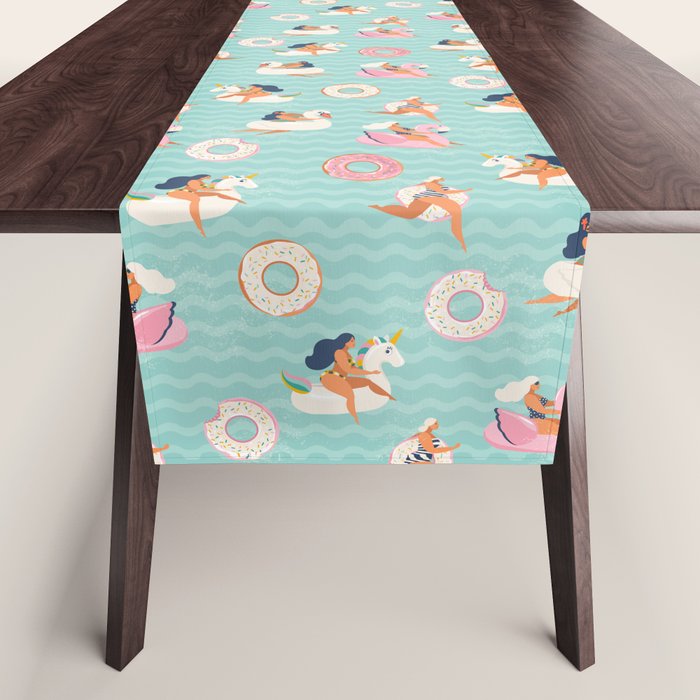 Gils on inflatable in swimming pool floats. Table Runner Gallery Image 1