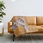 White Klimt Dog with Brown Eyes and Blue Jacket Throw Blanket Gallery Image 1