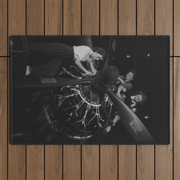 WWII aircraft engine installation by female workers inspirational black and white photograph   Outdoor Rug Gallery Image 1