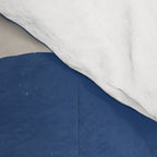 Woman Nude in Blue Comforter Gallery Image 4