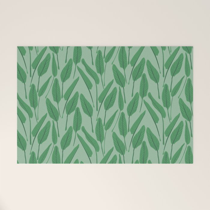 Tropical leaf pattern in cool greens Welcome Mat Gallery Image 1