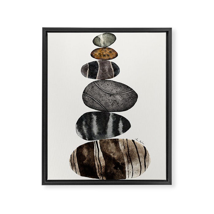 balancing beach pebbles Framed Canvas Print Gallery Image 1