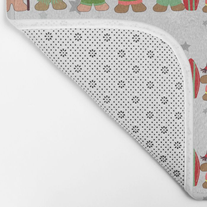 Gingerbread men and women on a gray background with stars. Gingerbread surfer. Gingerbread hula girl. Fun Christmas print. Bath Mat Gallery Image 2