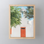 Orange Door in White Building in Greece - Summer Travel Mini Art Print Gallery Image 1