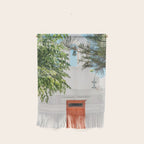 Orange Door in White Building in Greece - Summer Travel Wall Hanging Gallery Image 1