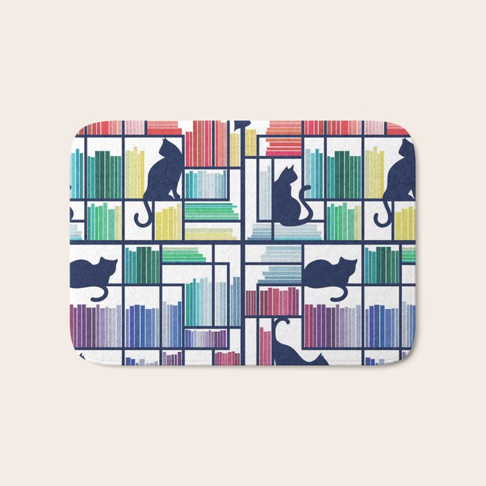 Rainbow bookshelf // white background navy blue shelf and library cats Bath Mat Gallery Image 1