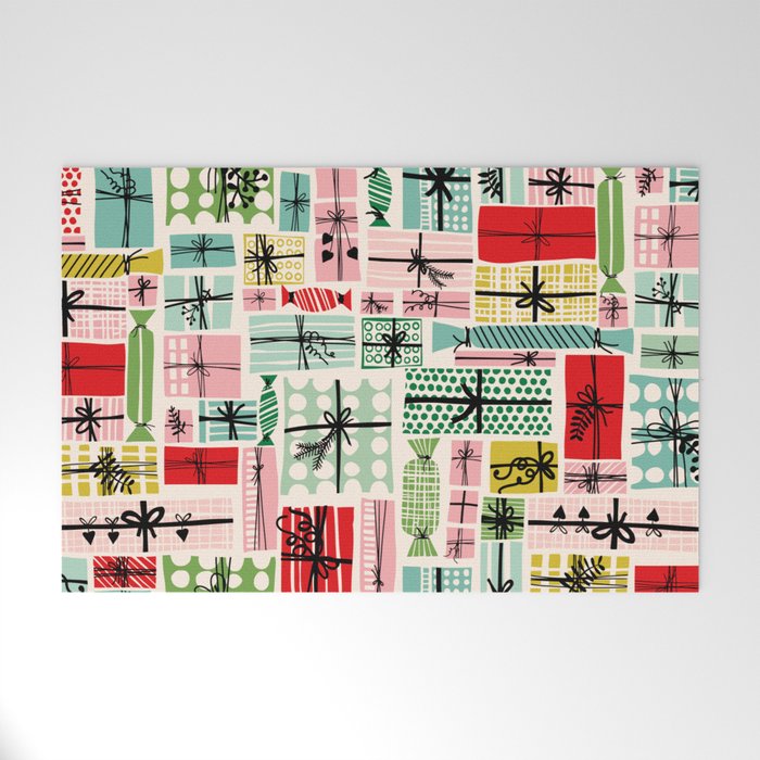 Wobbly pile of Christmas presents Welcome Mat Gallery Image 1