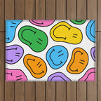 Colorful smiling happy face cartoon pattern Outdoor Rug Gallery Image 1