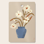 White flower in a blue vase Cutting Board Gallery Image 1