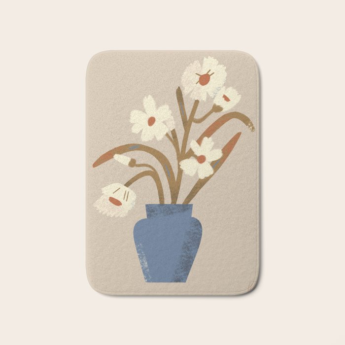 White flower in a blue vase Bath Mat Gallery Image 1