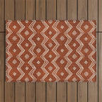 Village in Rust Outdoor Rug Gallery Image 1