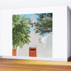 Orange Door in White Building in Greece - Summer Travel Wall Mural Gallery Image 2