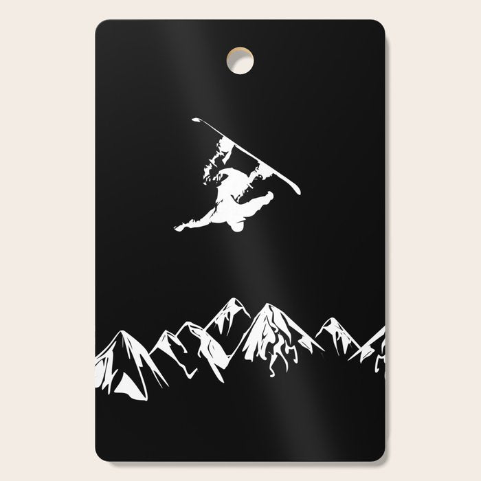 Rocky Mountain Snowboarder Catching Air Cutting Board Gallery Image 1