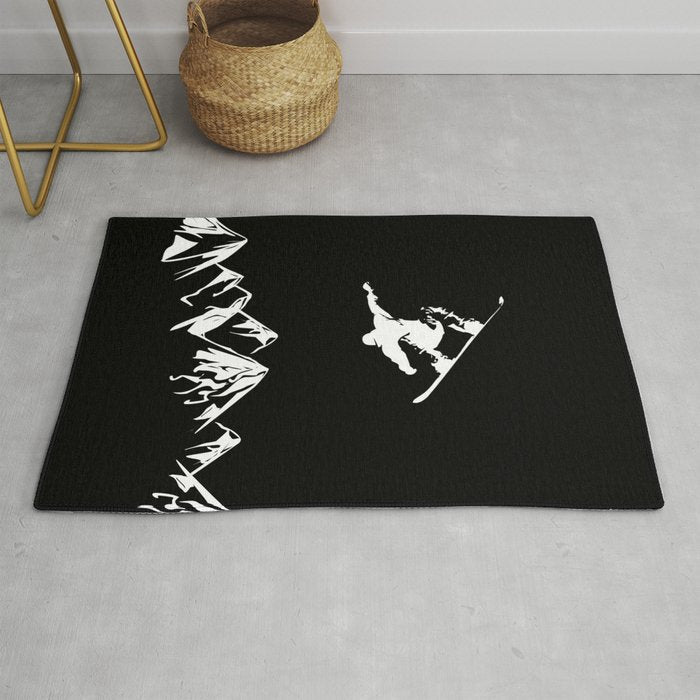 Rocky Mountain Snowboarder Catching Air Rug Gallery Image 1