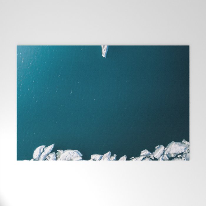 Minimalist Ice Bergs in the blue Ocean Welcome Mat Gallery Image 1