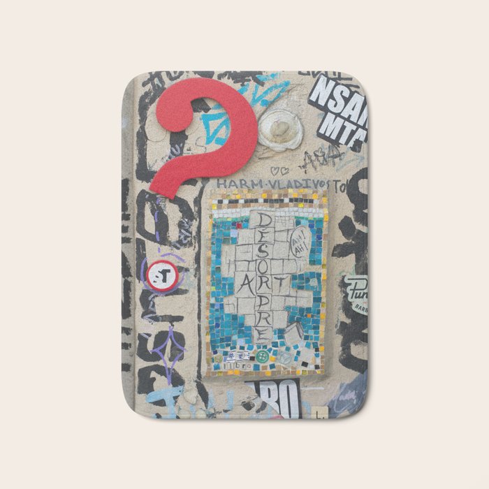 Red question mark on a wall Bath Mat Gallery Image 1