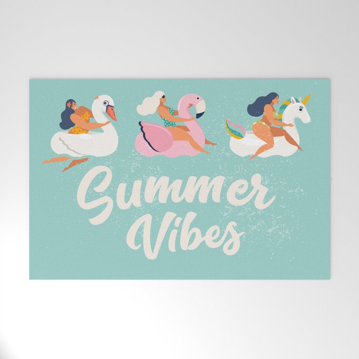 Gils on inflatable in swimming pool floats. Welcome Mat Gallery Image 1