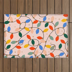 Colorful Holiday String Lights Pattern on Peach Background Outdoor Rug Gallery Image 1
