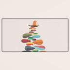 Bird nesting on top of pebbles hill Desk Mat Gallery Image 3