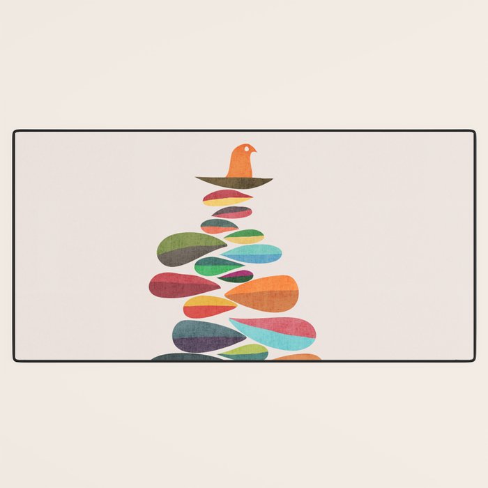 Bird nesting on top of pebbles hill Desk Mat Gallery Image 3