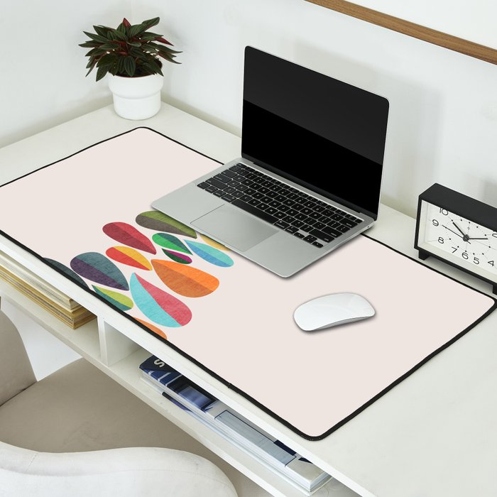 Bird nesting on top of pebbles hill Desk Mat Gallery Image 2