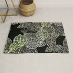 Elegant leaf skeleton foliage on black Rug Gallery Image 1