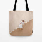 Girl Thinking on a Stairway Tote Bag Gallery Image 1