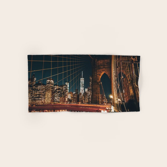 Brooklyn Bridge and Manhattan skyline in New York City at night Bath Towel Gallery Image 1