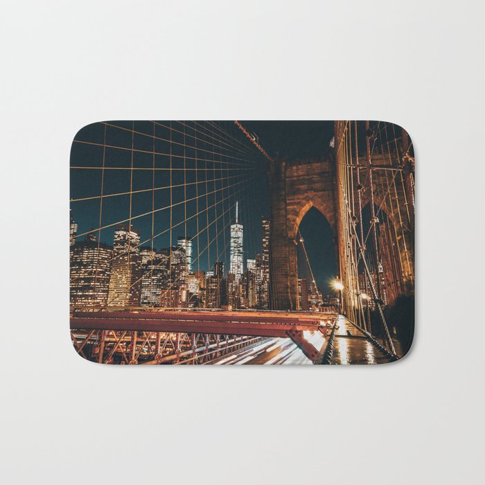 Brooklyn Bridge and Manhattan skyline in New York City at night Bath Mat Gallery Image 1