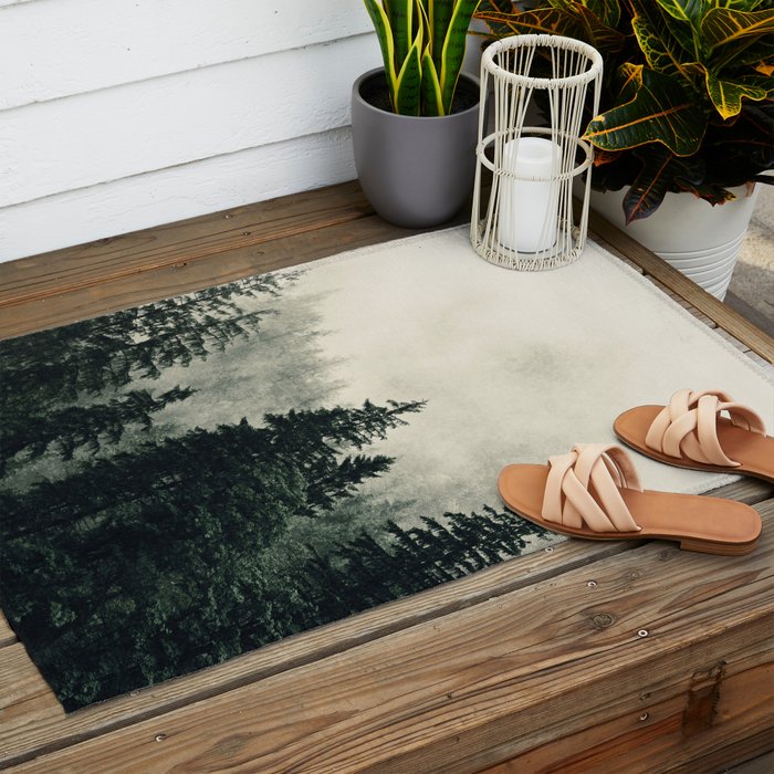 Thick pine forest in the descending mist Outdoor Rug Gallery Image 2