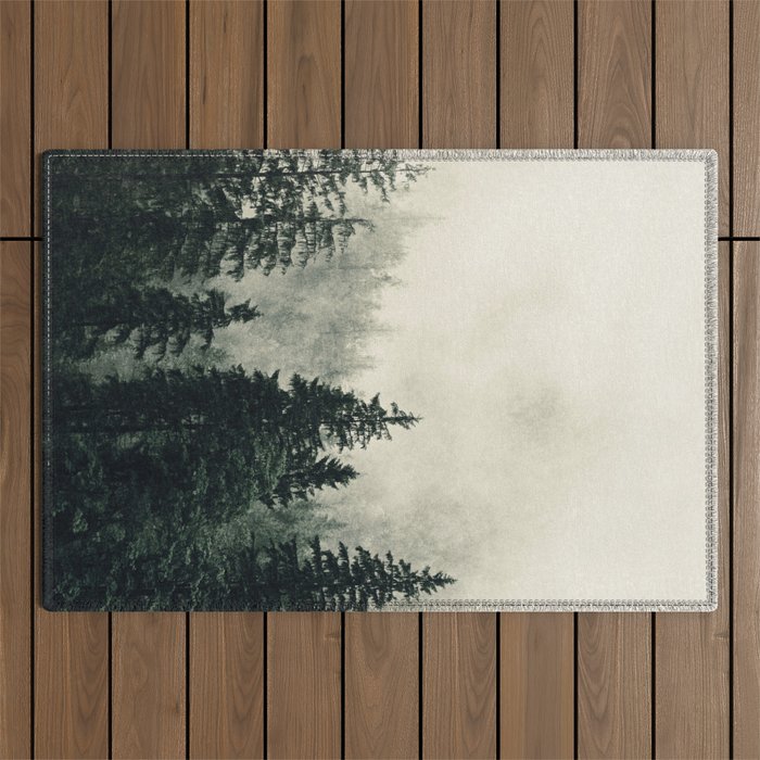 Thick pine forest in the descending mist Outdoor Rug Gallery Image 1