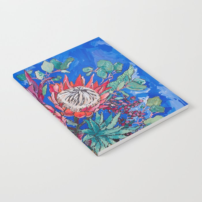 Painterly Bouquet of Proteas in Greek Horse Urn on Blue Notebook Gallery Image 2
