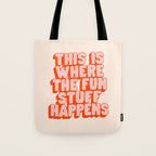This is Where the Fun Stuff Happens typography print in peach and red Tote Bag Gallery Image 1