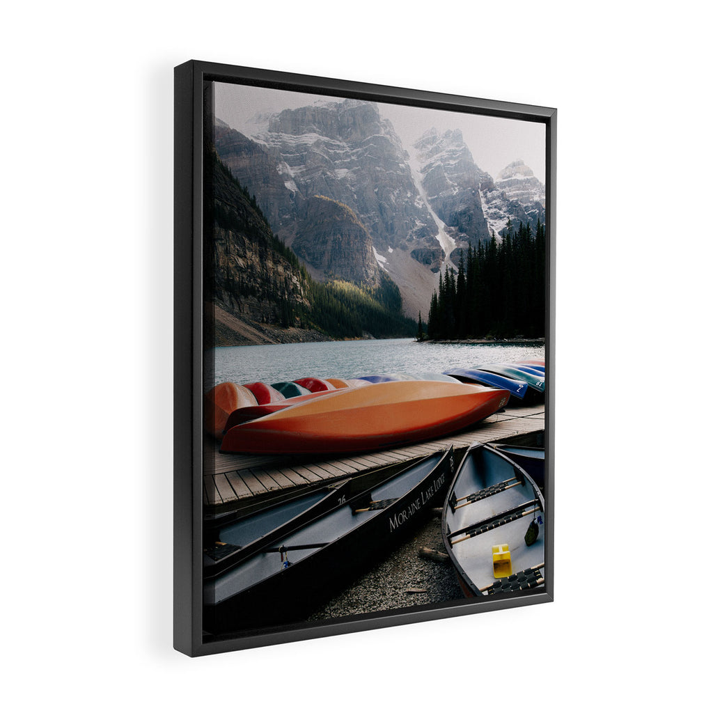 Moraine Lake Canoes Framed Canvas Print Gallery Image 2