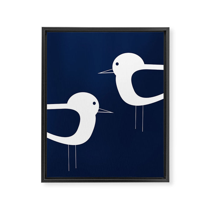 Shorebird Pair - Minimalist Beach Birds in White and Nautical Navy Blue Framed Canvas Print Gallery Image 1