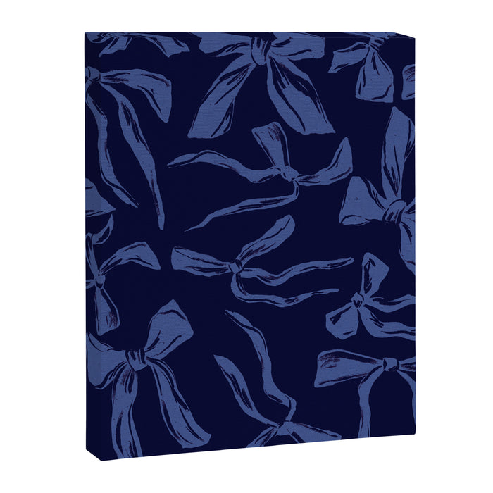 Blue bow pattern with dark background Canvas Print Gallery Image 1