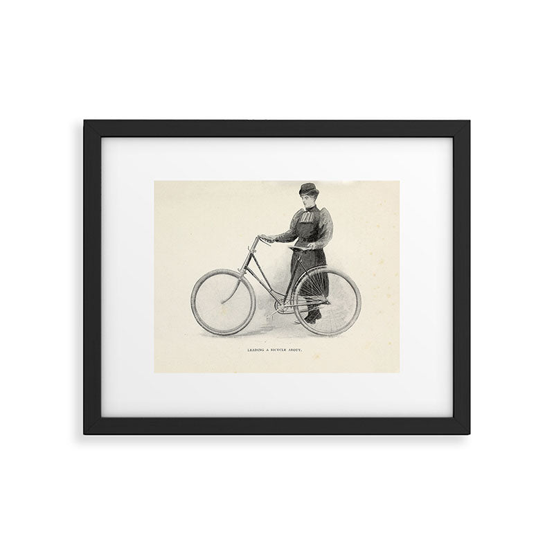 "Leading a Bicycle About" from "Bicycling for Ladies" by Maria E. Ward, 1896 Framed Art Print Gallery Image 5