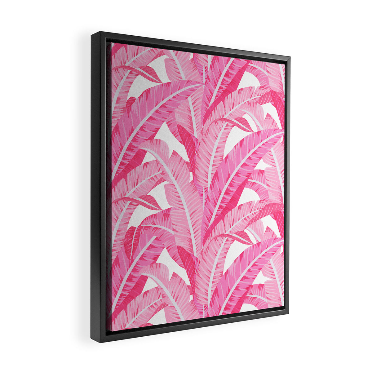 Pink banana leaves tropical pattern on white Framed Canvas Print Gallery Image 2