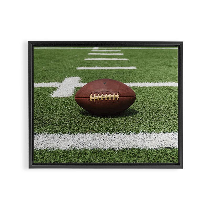 American Football Court with ball on Gras Framed Canvas Print Gallery Image 3