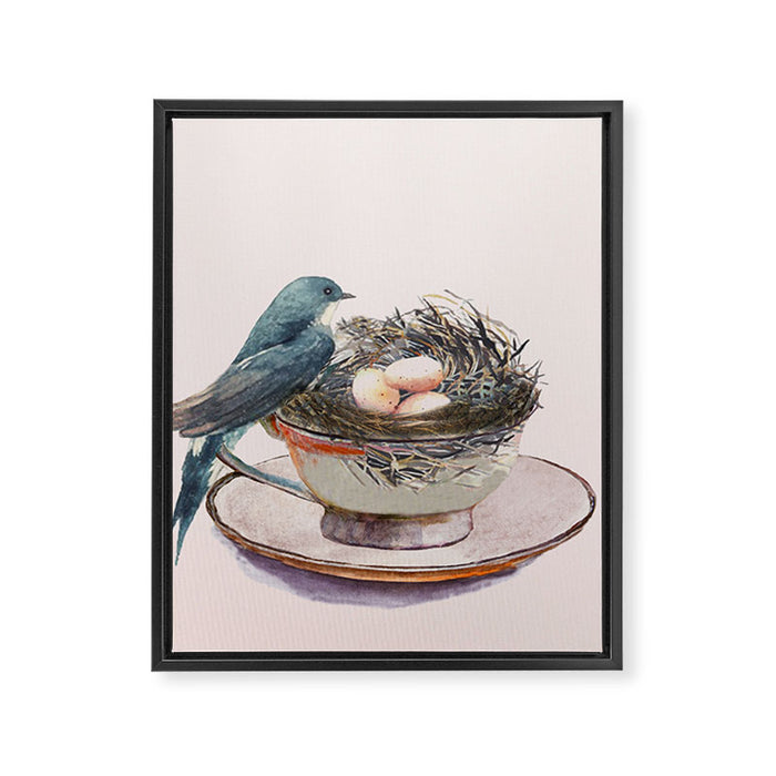 Bird nest in a teacup Framed Canvas Print Gallery Image 1