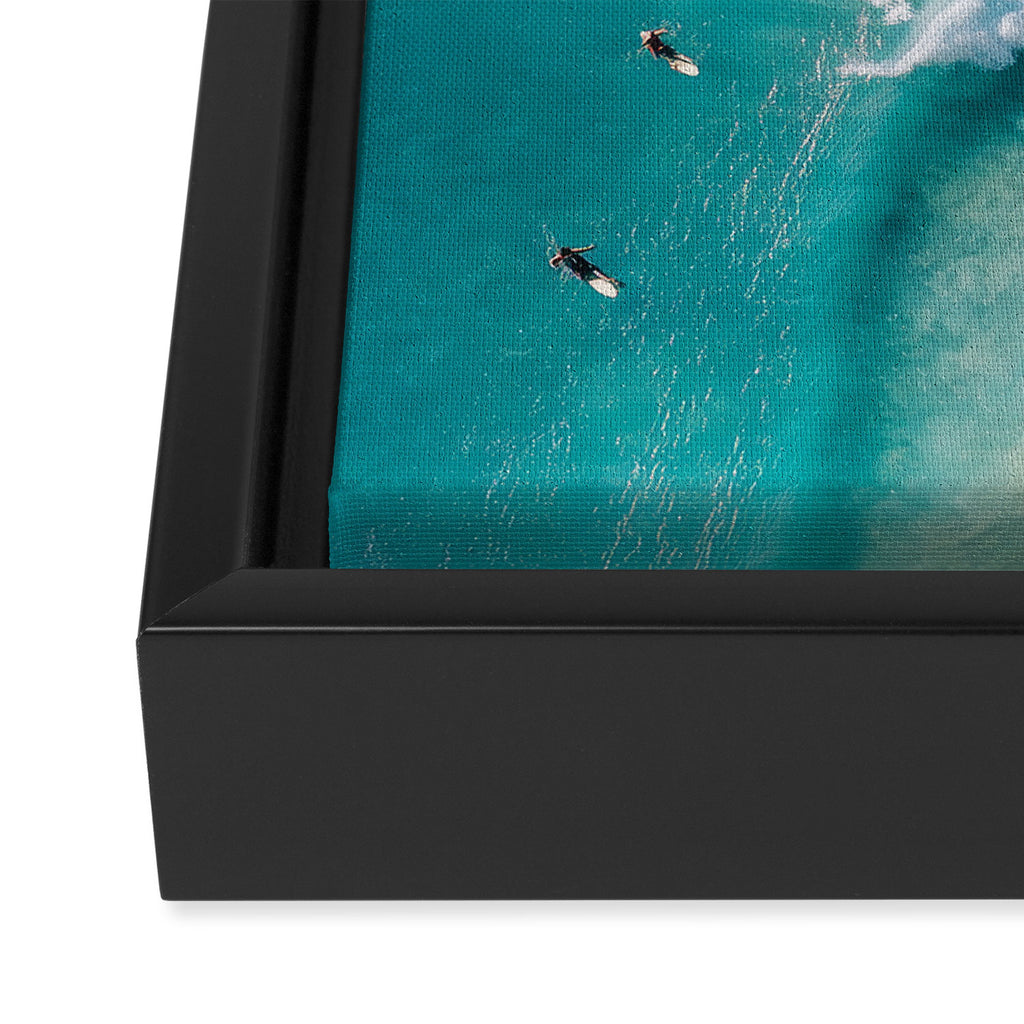 Surfers in Blue Waves Framed Canvas Print Gallery Image 3