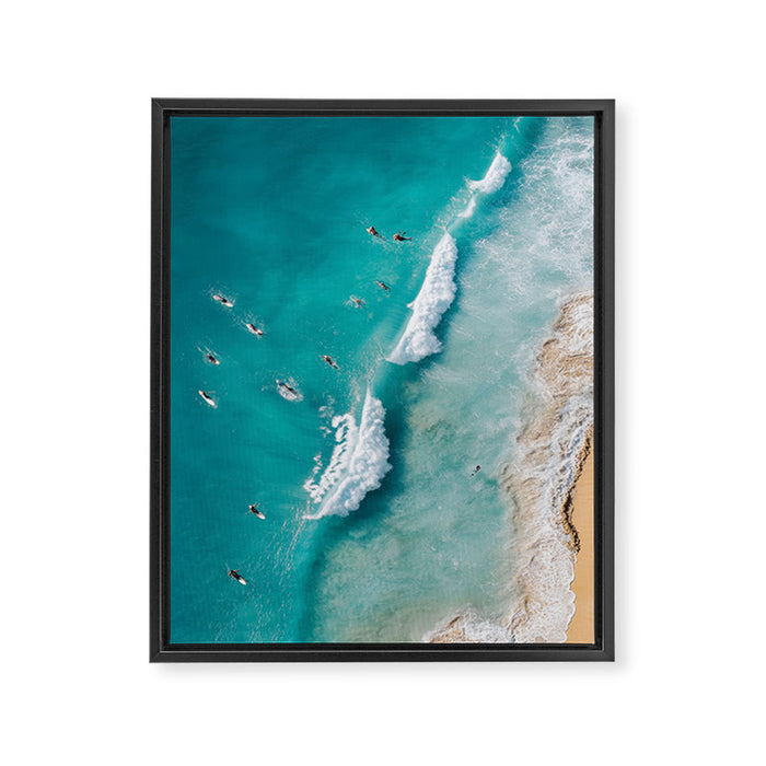 Surfers in Blue Waves Framed Canvas Print Gallery Image 1