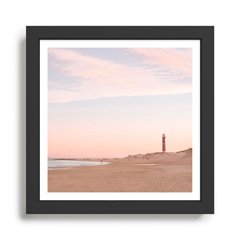 The beach and the lighthouse Framed Art Print