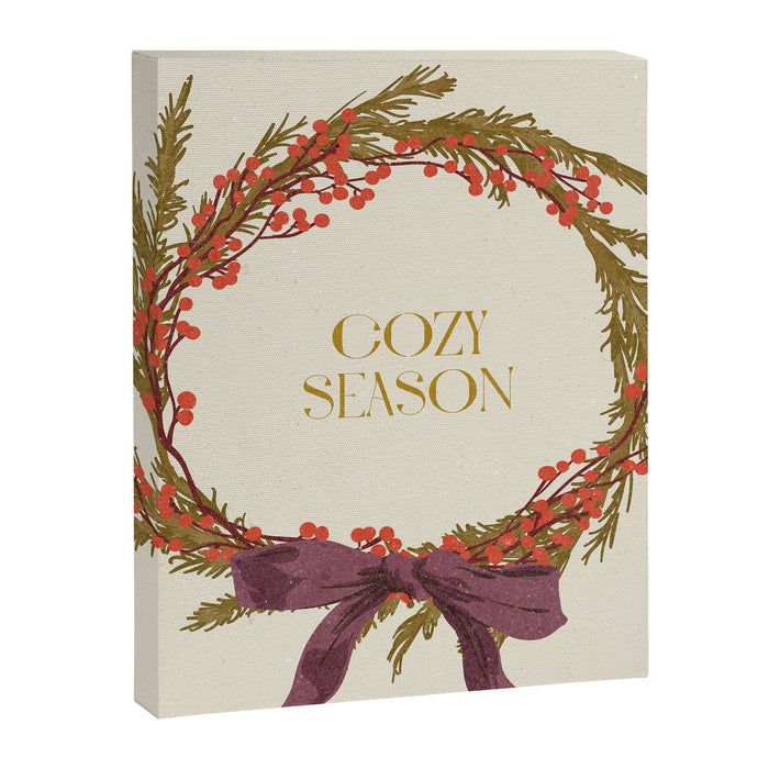 Cozy Season. Christmas wreath with bow Canvas Print Gallery Image 1